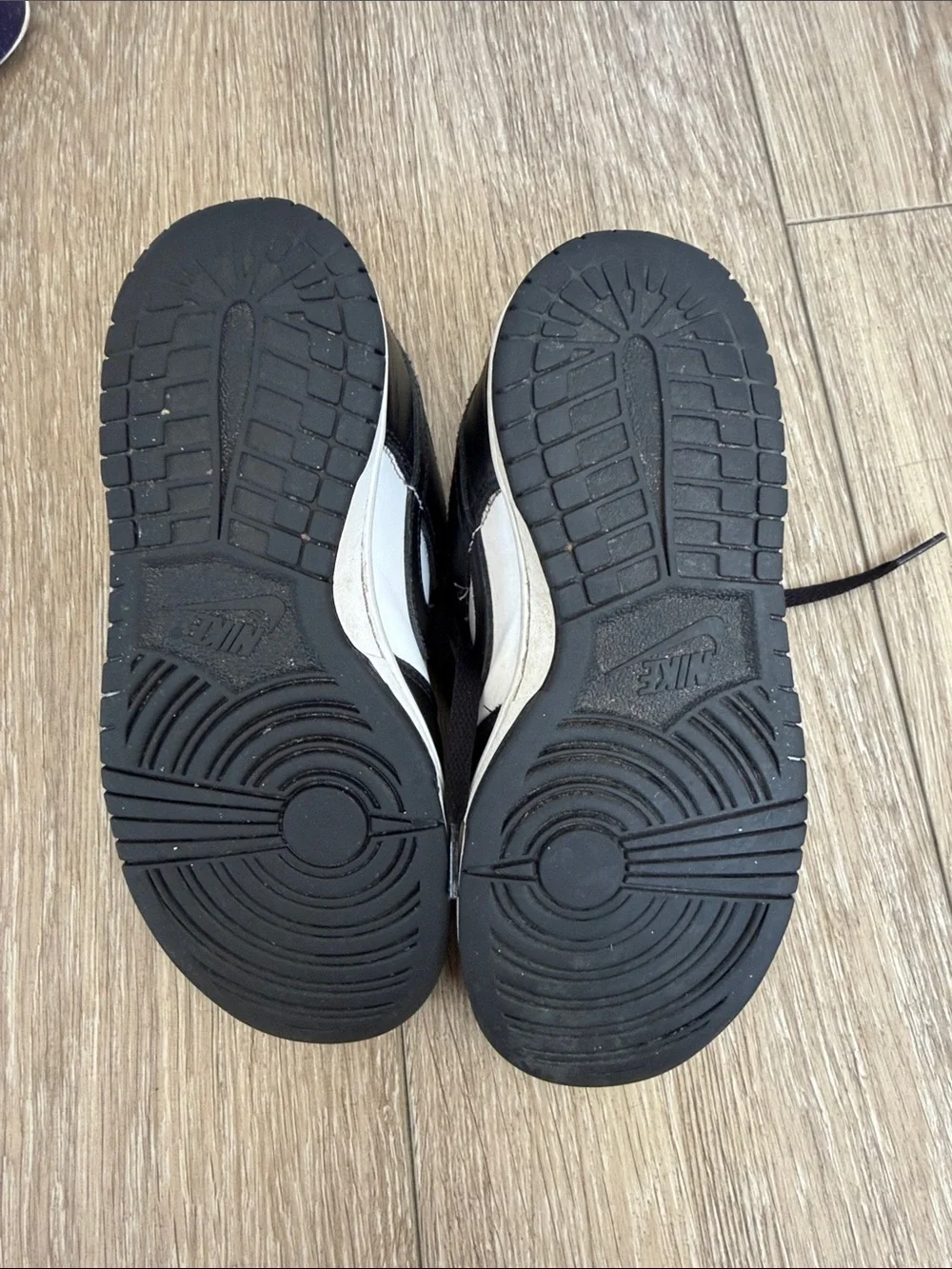 Youth Nike Low-Top Sneakers in Black and White Pandas